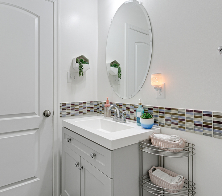Small bathroom vanity with colorful backsplash Small bathroom vanity with colorful backsplash