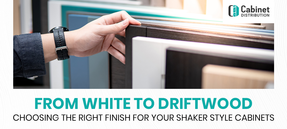 Hand selecting between white and driftwood Shaker style cabinet doors