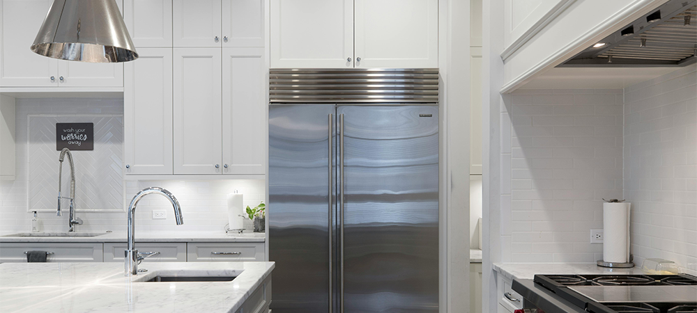 White shaker kitchen with stainless steel appliances White shaker kitchen with stainless steel appliances