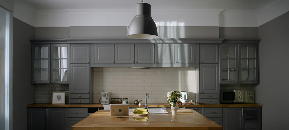 Modern white shaker kitchen with stainless steel appliances Modern white shaker kitchen with stainless steel appliances