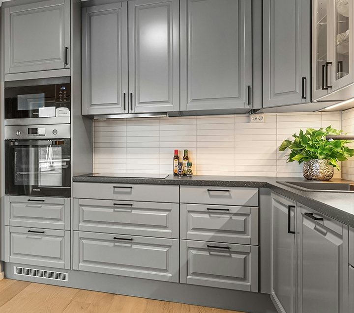 Dove gray cabinetry with open living space Dove gray cabinetry with open living space