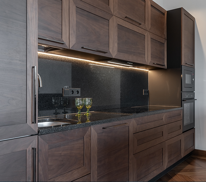 Driftwood cabinets with black granite backsplash Driftwood cabinets with black granite backsplash