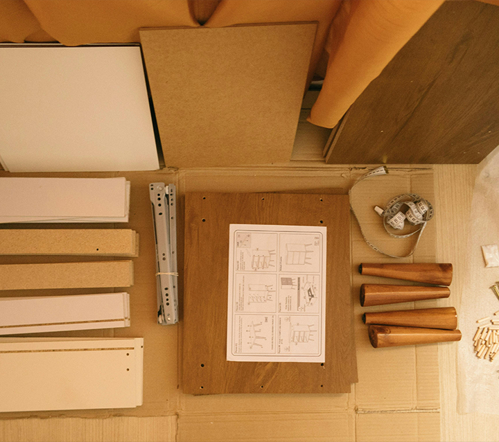 Flat-packed RTA cabinet parts laid out for assembly Flat-packed RTA cabinet parts laid out for assembly
