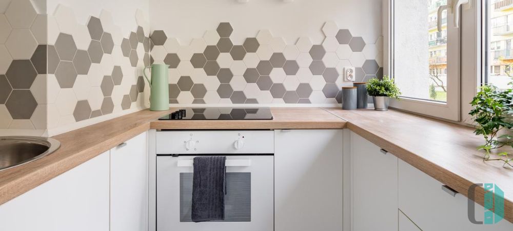 geometric shaped tiles for white backsplash kitchen